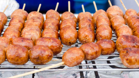 Thai Sausage Northeastern Style. Traditional E-san Sausage, pork mix rice sausage (Sai Krawk E-san)の写真素材