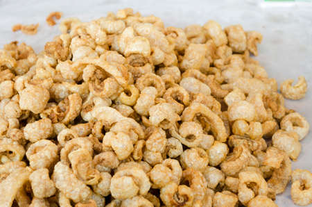 Close-up view of pork snack or also called pork rind, the leather or leather lean pork fried crispy and blisteredの写真素材
