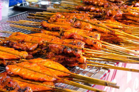 Thai street food grilled chicken.の写真素材