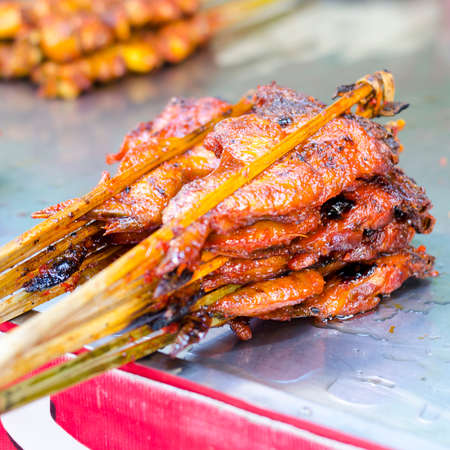 Thai street food grilled chicken.の写真素材