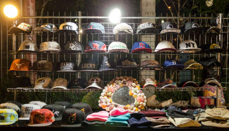 BANGKOK,THAILAND - 2 FEBRUARY 2017 : Selling cap hat at Jatujak Green night marketのeditorial素材