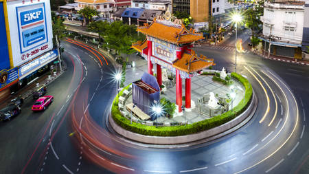 BANGKOK, THAILAND - FEBRUARY 8, 2017: Traffic passes through Chinatown at Odeon Roundabout. The roundabout marks one end of Chinatownのeditorial素材