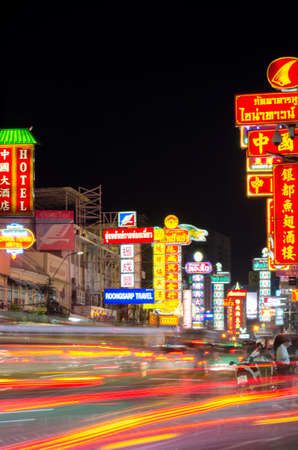 CHINATOWN, BANGKOK, THAILAND - FEBRUARY 8, 2017 : Cars and shops on Yaowarat road. Chinatown with notable Chinese buildings, restaurants and decoration. Busy Yaowarat Road at night.のeditorial素材