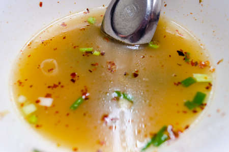 bowl after ate Chinese roll noodle soupの写真素材