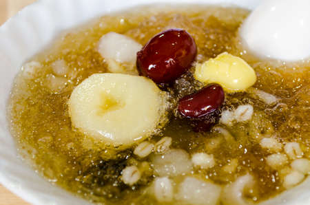 Chinese dessert, cold boiled Ginkgo with the Longan soup in Thailand.の写真素材