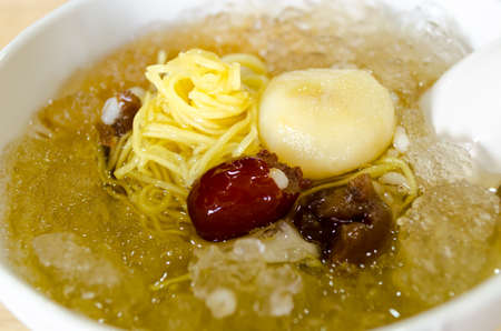 Chinese dessert, cold boiled Ginkgo with the Longan soup in Thailand.の写真素材