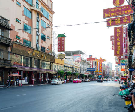 CHINATOWN, BANGKOK, THAILAND - FEBRUARY 8, 2017: Cars and shops on Yaowarat road, the main street of China town.のeditorial素材