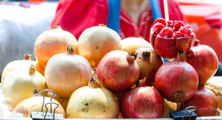selling pomegranate fruit at street Thailandの写真素材