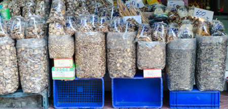 a pile of dried mushroom sell in chinese marketの写真素材