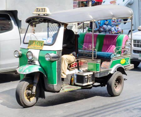 BANGKOK,THAILAND - 8 FEBRUARY 2017 : Tuk-Tuk on Yaowarat road in Bangkok,Samlor or three wheel bike is one of must do in Bangkok trip.のeditorial素材