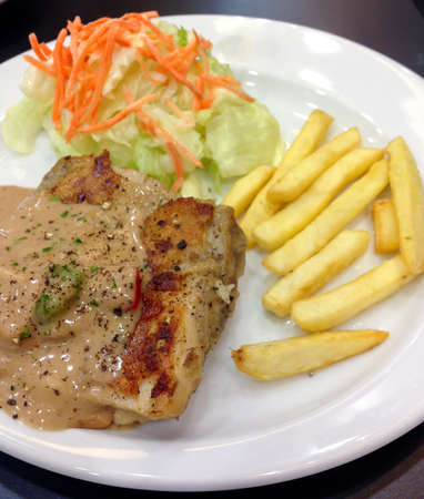 Chicken steak with black pepper sauceの写真素材