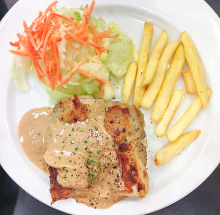 Chicken steak with black pepper sauceの写真素材
