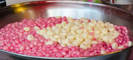 Water Chestnuts in Coconut Milk Tub Tim Grobの写真素材