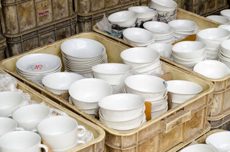 selling ceramic tableware at Jatujak weekend market,Bangkok Thailand.