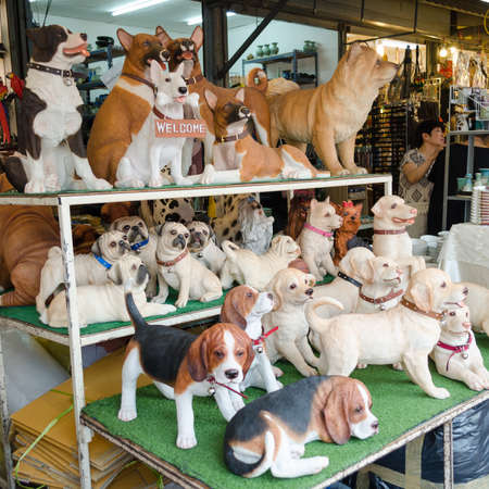 BANGKOK,THAILAND - 19 FEBRUARY 2017 :Selling ceramic Dog for decoration at Jatujak weekend market.のeditorial素材