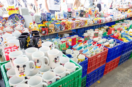 BANGKOK,THAILAND - 19 FEBRUARY 2017 :Selling ceramic mug for drinking beverage at Jatujak weekend market.のeditorial素材