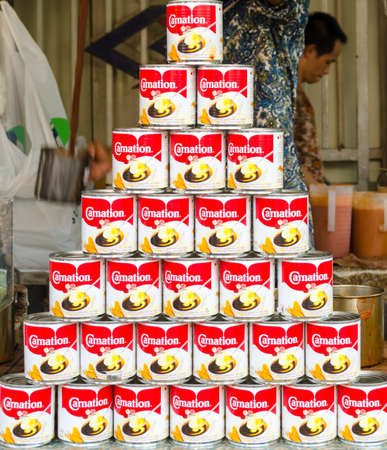 BANGKOK,THAILAND - 19 FEBRUARY 2017 : Sweetened condensed milk Carnation for sweet beverage at Jatujak weekend market.のeditorial素材