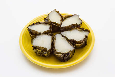 Basket shaped Chinese pudding on white backgroundの写真素材
