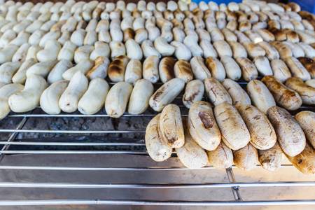 Grilled bananas on the grill on the market in Thailand.の写真素材
