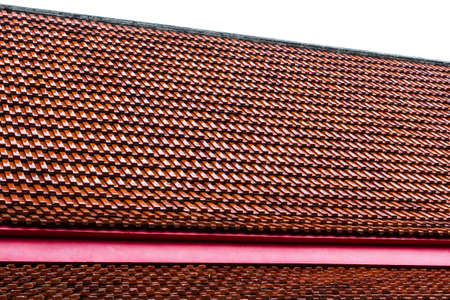 The red roof of the temple Thailand on a white background.の写真素材