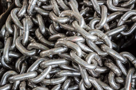 Close up chains tangled as a background with a group の写真素材