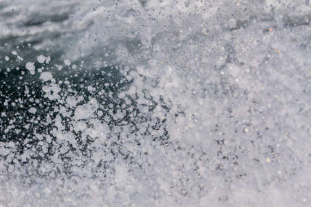 Close up water spray from the sea waves. の写真素材