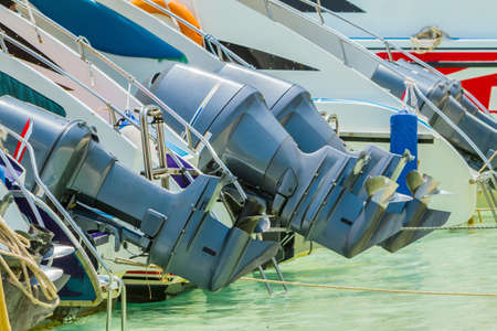 Group of Speed Boat's Engines at marina,Viewed from the stern. の写真素材