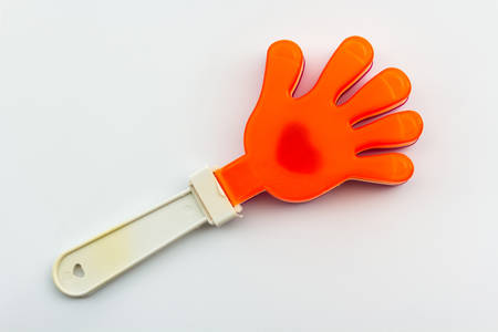 Colorful of hand clap toy, plastic toy hands for applause on white background.の写真素材