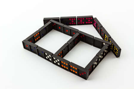 Dominoes in House Shape on White Background.の写真素材