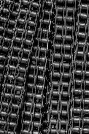 Close up line of chains as a texture background. 
