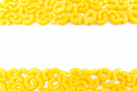 Raw macaroni isolated on white background.の写真素材