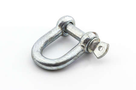 Steel hardware for fitting electrical cable on white background. 