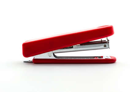 Closeup Red Stapler on white background.