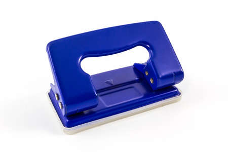 Blue office paper hole puncher on white background. の写真素材
