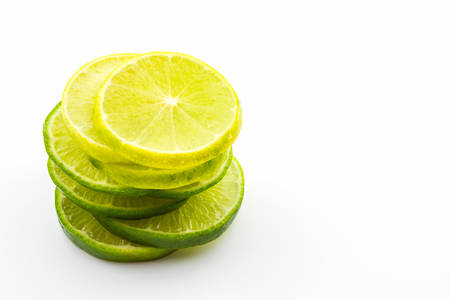 Group of fresh lime slices on white background.の写真素材