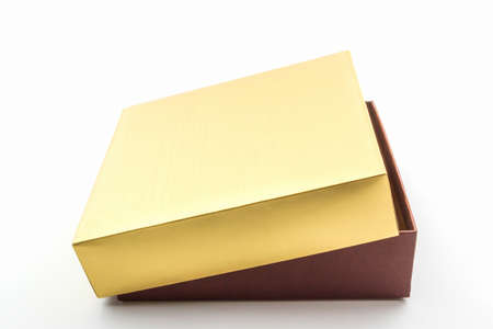 Gold and brown box on white backgorund.