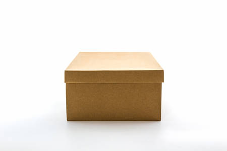 Brown shoe box on white background with clipping path. For shoes, electronic device and other products.の写真素材