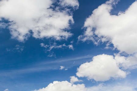 Blue sky background with white clouds. 