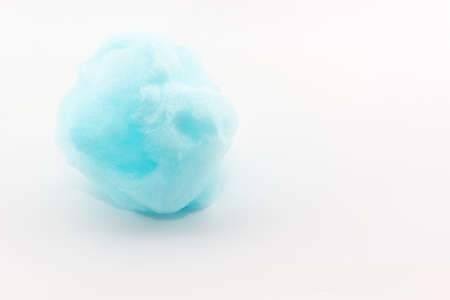Blue spun sugar on white background, Cotton Candy. の写真素材