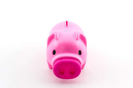 Pink piggy bank saving on white background.の写真素材