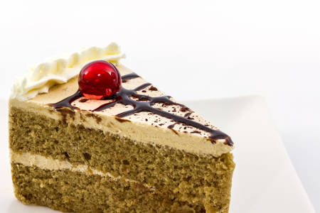 Close up Coffee cake slice on white background. 