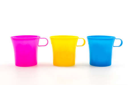 Colorful of cup in row on white background.の写真素材