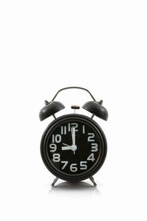 Black old fashion alarm clock on white background.