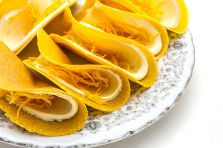 Ancient Thai Crispy pancake on white background, sweet dessert, crispy sticky dumpling. の写真素材