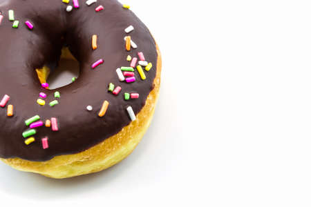Chocolate donut with Sprinkles on white background. の写真素材