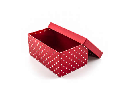 Red polka dots box on white background. の写真素材