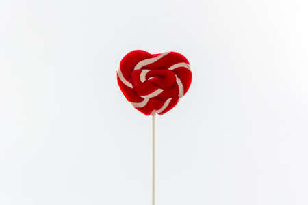 Sweet candy, heart shaped isolated on white background.の写真素材