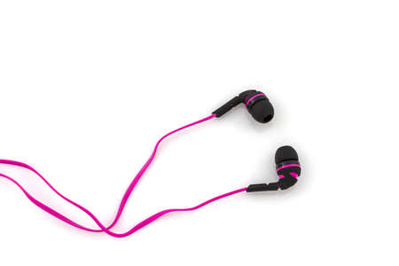 Pink headphones on white background.