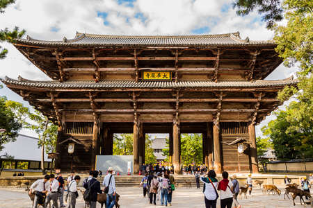 NARA, JAPAN - October 23, 2014: Tourists visit Todai-ji temple on October 23, 2014 in Nara. This measure has been registered as a World Heritage Site. Is enshrined largest bronze statue of the Buddha Vairocana (Daibutsu).のeditorial素材