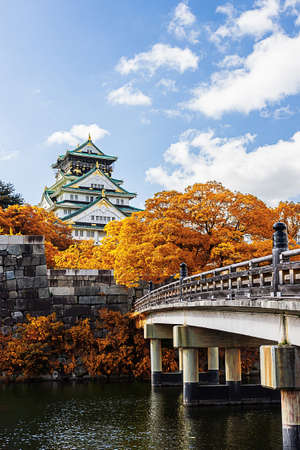 Osaka Castle in Osaka  with autumn leaves, Japan